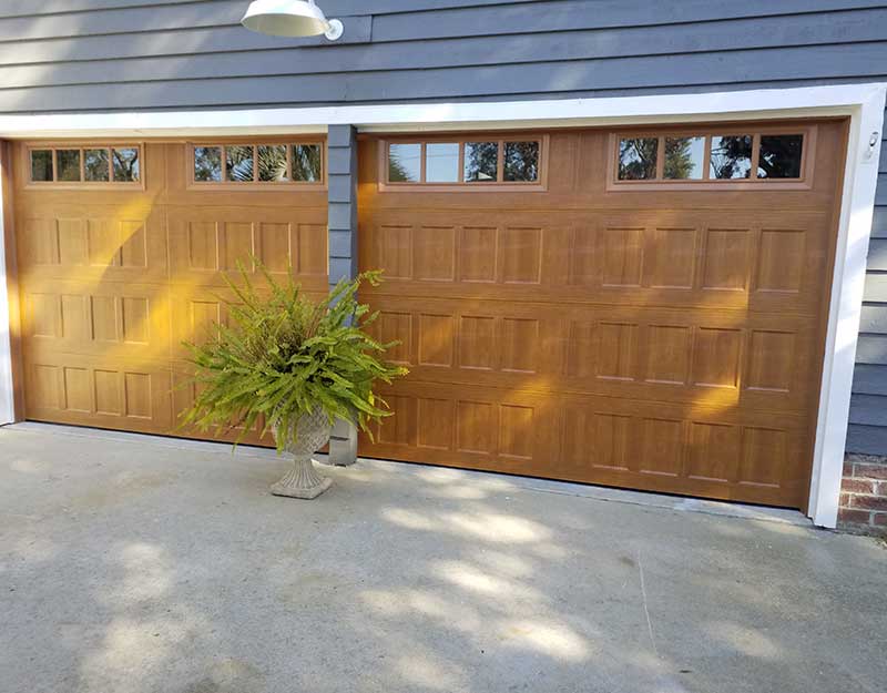 "After" image of garage door with new panels